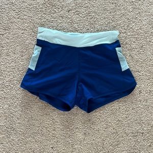 Girls blue athletic shorts. Size: (10-12)